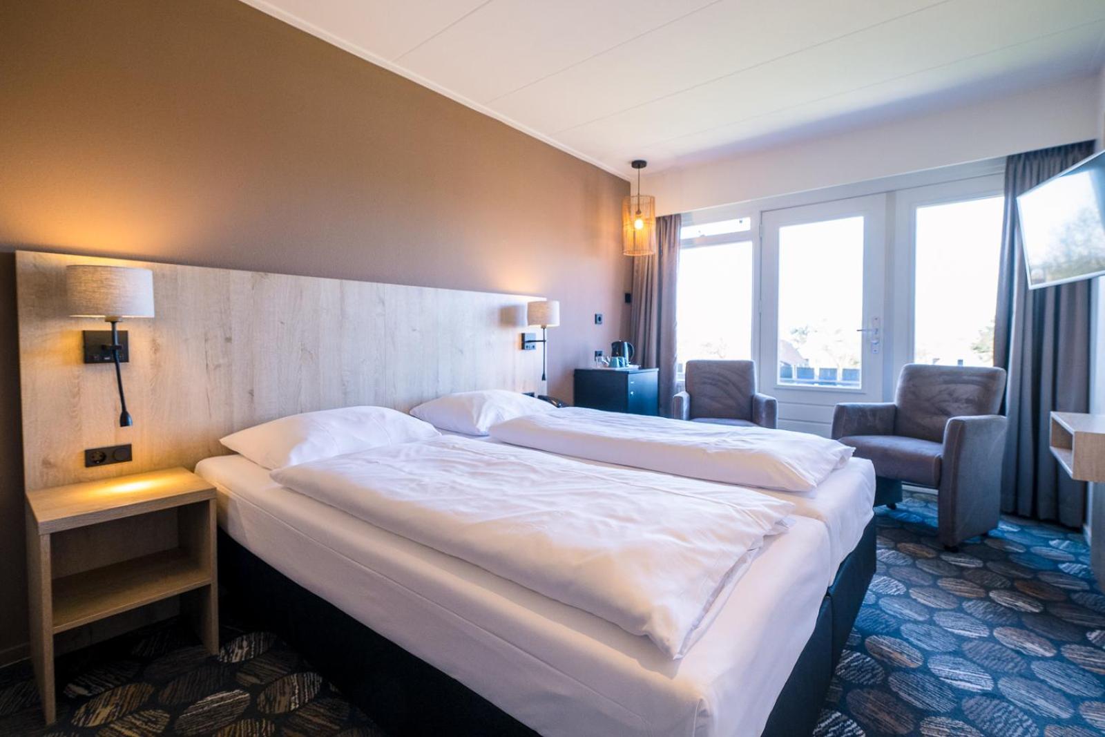 Hotel Hofker Нес Экстерьер фото